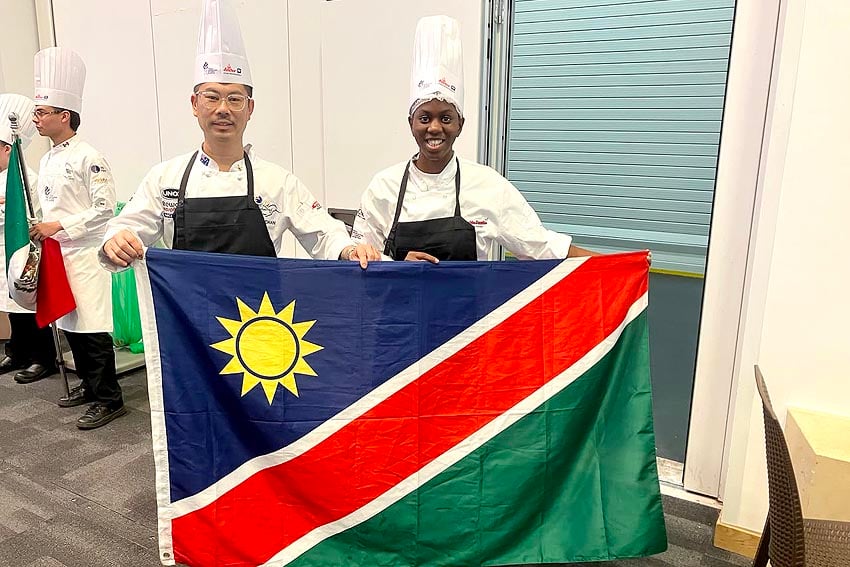 26-06-16 Global Chefs Challenge Elizabeth Isai Aussie Assistant NamFlag 26-05 web 850 x 567