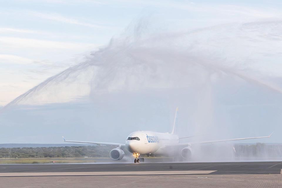 Water fountains welcoming Airbus aircraft Discover Airlines maiden flight new route Munich Windhoek