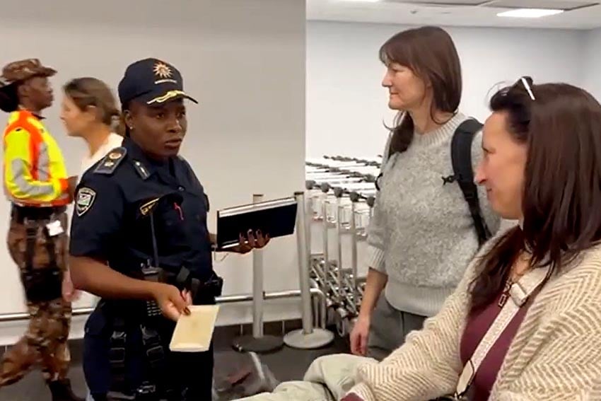In action Hosea Kutako International Airport near Windhoek head of NamPol Tourism Protection Unit Chief Inspector Christina van Dunem daFonsech-Shikongo giving incoming tourists tips to prevent theft Photo Screenshot from One Africa report